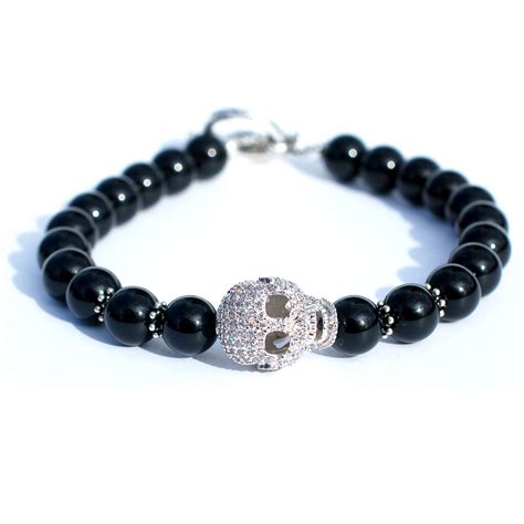 Silver Iron Skull Silver crystal skull bracelet with silver accent, black onyx beads and silver ...