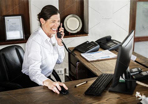 Receptionist Working At The Front High Quality Holiday Stock Photos