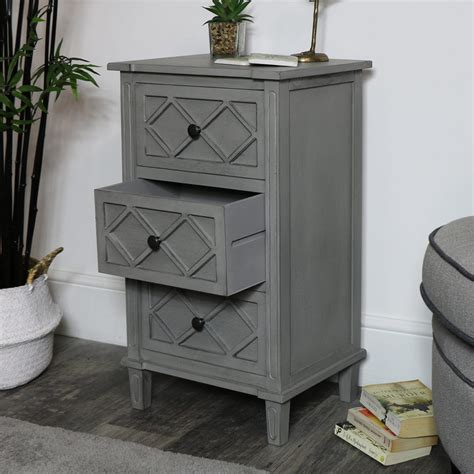 If you're short on floor space, don't be afraid to think vertical. Grey Bedside Cabinet - Venice Range - Windsor Browne