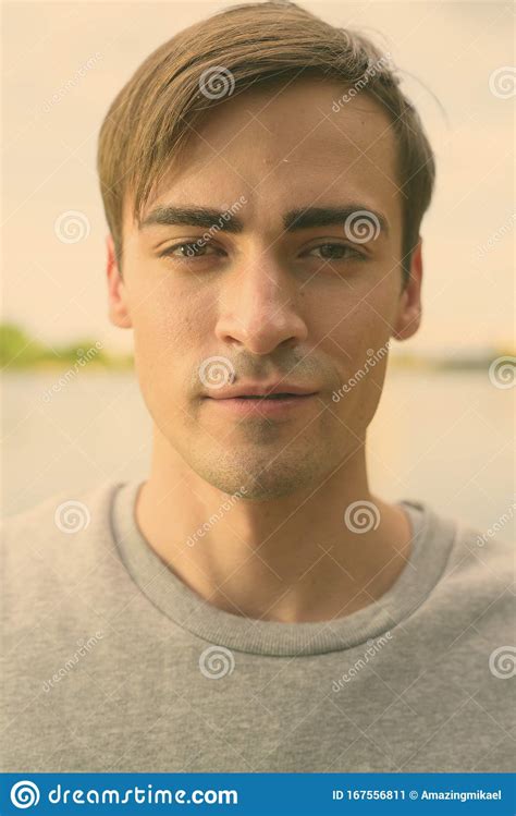 Young Handsome Man Relaxing At The Park Stock Image Image Of Closeup