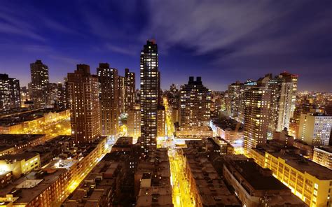 Lighted High Rise Building In The City During Nighttime Hd Wallpaper