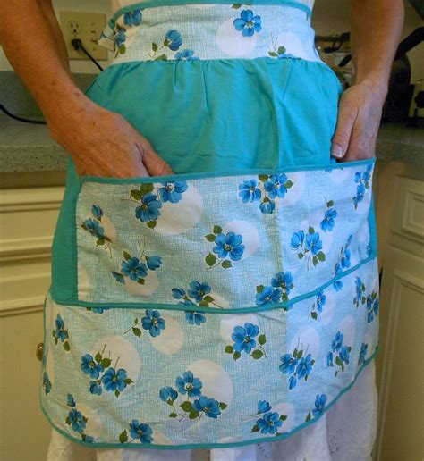 Check out this huge list of free apron patterns! Teal floral half apron blue and white apron by ...