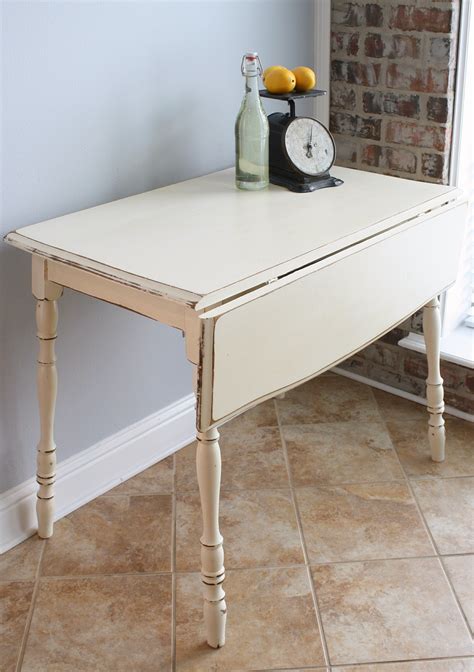 Combine a drop leaf table and a sofa bench and you'll create a very flexible space which can either be a cozy breakfast nook, a work desk or the seating area in your spacious kitchen. Vintage Drop Leaf Kitchen Table