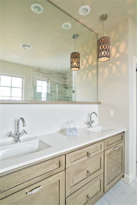You can also hang a pendant light lower over a dining. Contemporary Pendant Lights Above Bathroom Sink ...
