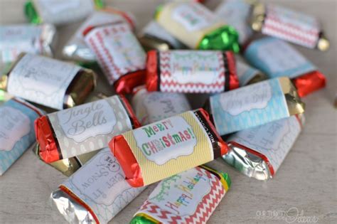 Why origami with regular paper when you can use colorful wrappers instead? mini Candy Bar Christmas Wrappers & Tag - Our Thrifty Ideas