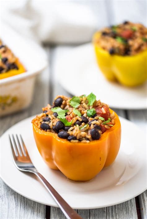As we are both trying to lose some weight from the holidays, we are trying some healthier recipes. Southwestern Stuffed Peppers | The Nut-Free Vegan