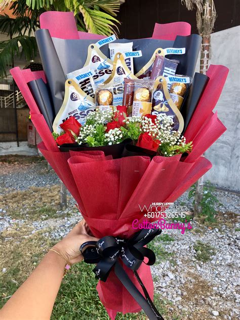 Beautiful chocolate arrangements in the form of a bouquet using chocolates like ferrero rocher, cadbury, snickers, twix, and many more. Please do not hesitate to whatsapp me if you require ...