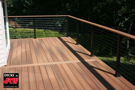 Composite Decking With Black Railing And Stainless Steel Cable Infill