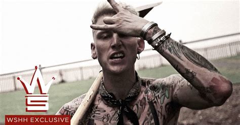 Eminem Takes All Of 30 Seconds To Deliver A Knockout Blow To Man Bunned Machine Gun Kelly In