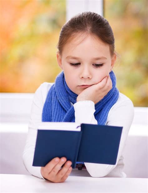 Little Girl Is Reading A Book Stock Photo Image Of Reading Brunette