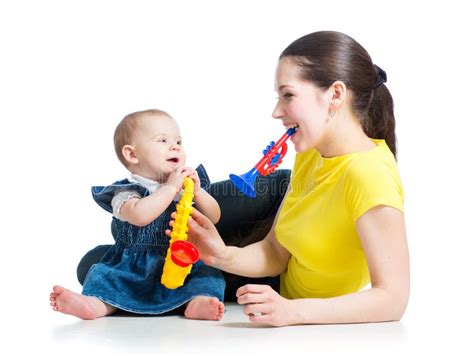 Mother And Baby Girl Play Musical Toys Stock Image Image Of