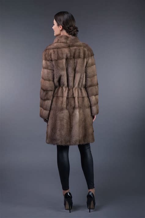 natural pastel mink fur coat in horizontal sripes handmade by nordfur