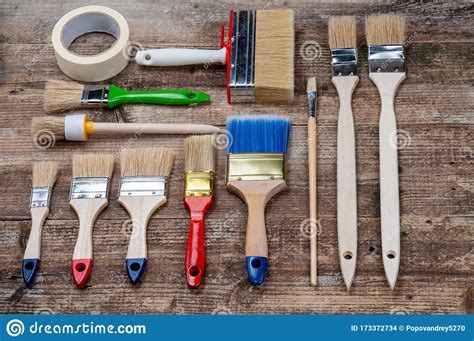 Assorted Paint Brushes On Wooden Background Stock Photo Image Of