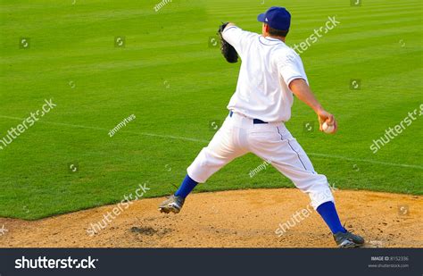 Professional Baseball Pitcher Throwing The Ball Stock Photo 8152336