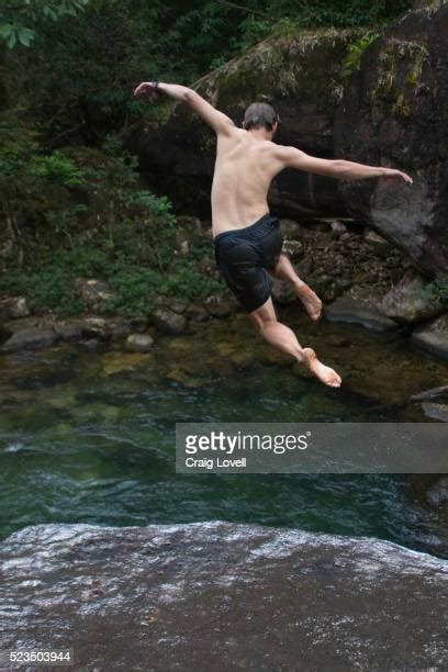 Man Cliff Jumping Photos And Premium High Res Pictures Getty Images