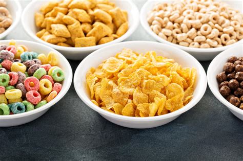 Variety Of Cold Cereals In White Bowls Stock Photo Image Of Crunchy