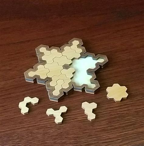 3d wooden burr puzzle plum blossom aka snowflake with commentary. SnowFlake Puzzle - Puzzle Mist
