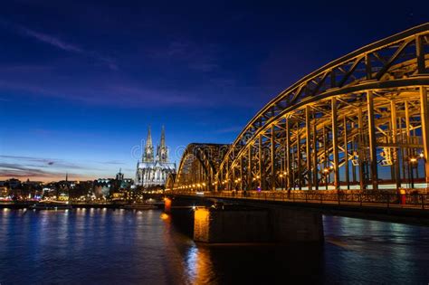 Cologne Skyline With Cologne Cathedral And Hohenzollern Bridge At Night