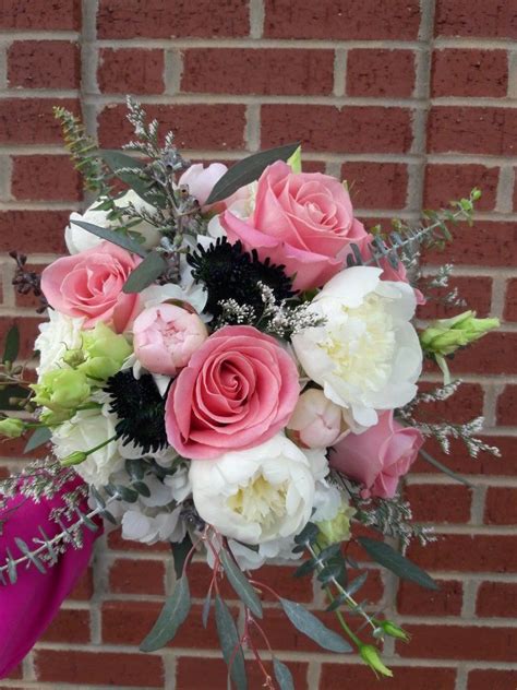 The large round head is a cluster of small pink, purple, white, blue or there are many color choices for a pretty hydrangea wedding bouquet. Pink, white and navy bridal bouquet using limonium ...
