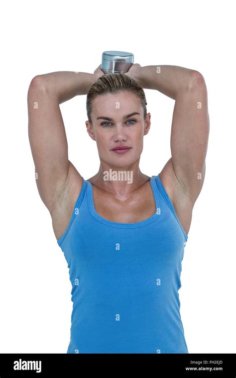 Muscular Woman Exercising With Dumbbells Stock Photo Alamy