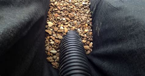 Since the pipe is solid, and not perforated, there's no need to provide gravel for drainage along the length of the drainpipe. DIY French Drain Installation Video - Gutter Help