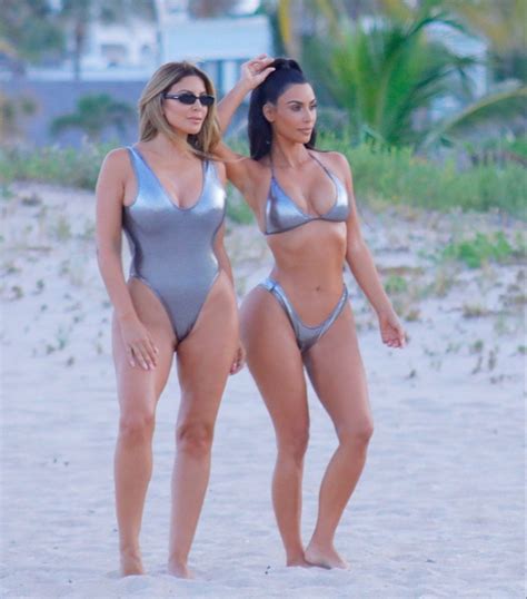 Kim Kardashian Bikini Shoot Interrupts Holiday As She Poses On Beach