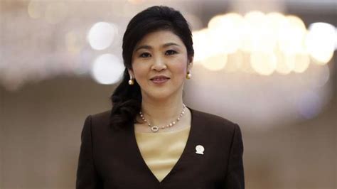 yingluck shinawatra to step down as thai prime minister after guilty verdict