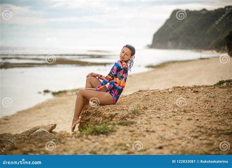 Girl Posing Sitting On Rocks At The Beach Stock Image Image Of Gorgeous Nature 122833081