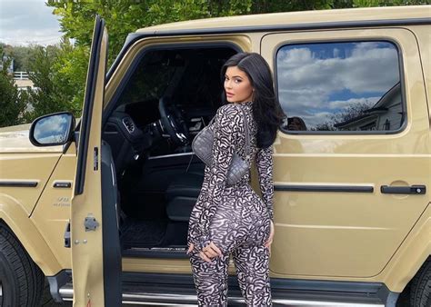 Kylie Jenner Shows Off Fabulous Curves While Posing Next To Her Mercedes Benz Suv Celebrity