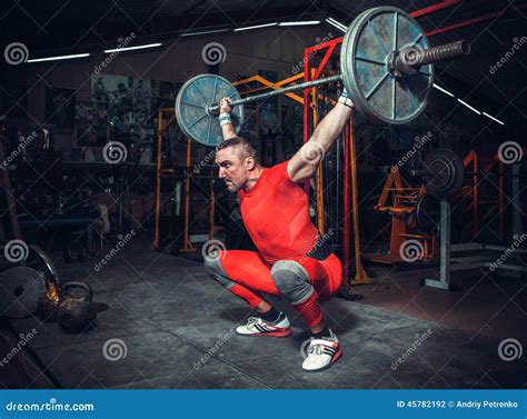 Powerlifter With Strong Arms Lifting Weights Stock Photo Image Of