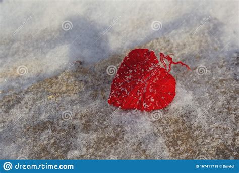 Red Woolen Heart On A Snowy Wooden Surface Stock Image Image Of
