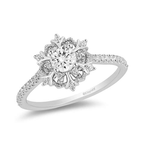 Cinderella's ring was my favorite of the ones in the article that i linked to above; Enchanted Disney Fine Jewelry 0.50ct Diamond Elsa Ring | H.Samuel | Heart diamond engagement ...