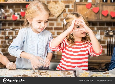 Kids Making Cookies — Stock Photo © Olgazakrevskaya 135726164