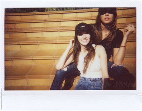 Cheerful Girlfriends Posing On Polaroid By Stocksy Contributor