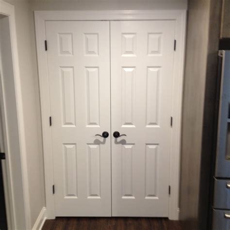 Basement Renovation Double Hung Closet Door Wit New Bronze Hardware