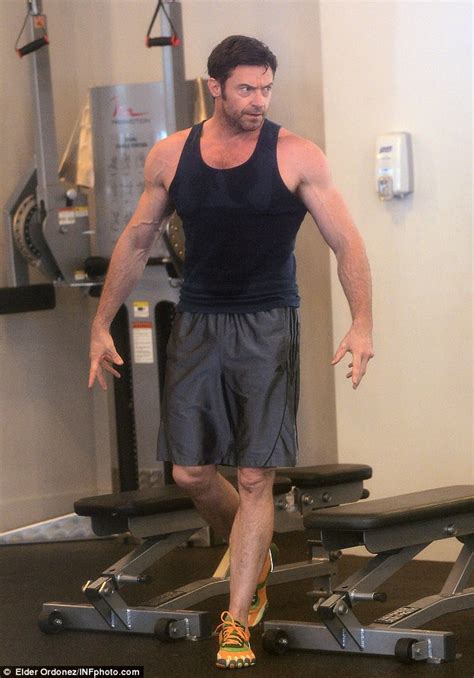 Hugh Jackman Flexes His Mean Biceps And Rock Hard Abs During Early