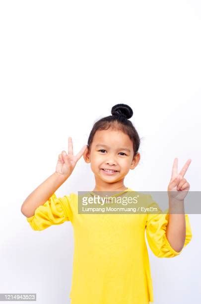 Kids Peace Sign Photos And Premium High Res Pictures Getty Images