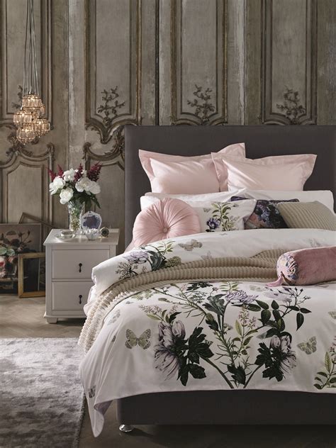 Classically Feminine In Florals And Pale Pinks This Bedding Set Is