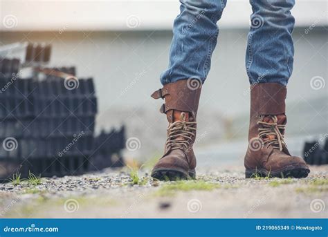 men wear construction boots safety footwear for worker at construction site engineer wear jeans