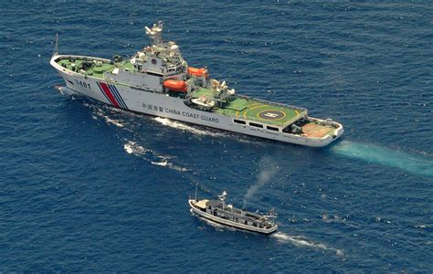 China Coast Guard Ships Fire Water Cannons At Philippine Vessels