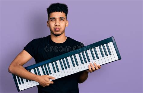 Man Holding Piano Keyboard In His Hands Stock Image Image Of Party