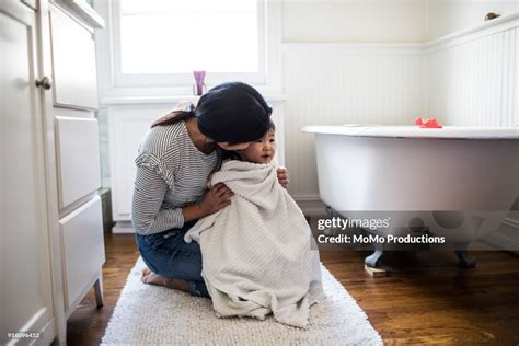 Mother Drying Daughter Off After Bath High Res Stock Photo Getty Images