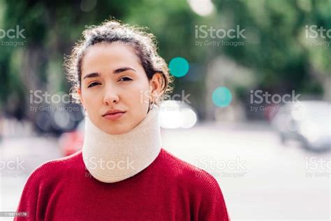 Portrait Of Confident Woman Wearing Neck Brace Stock Photo Download