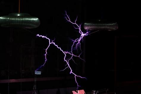 Premium Photo Artificial Lightning From Tesla Coils Over The Layout