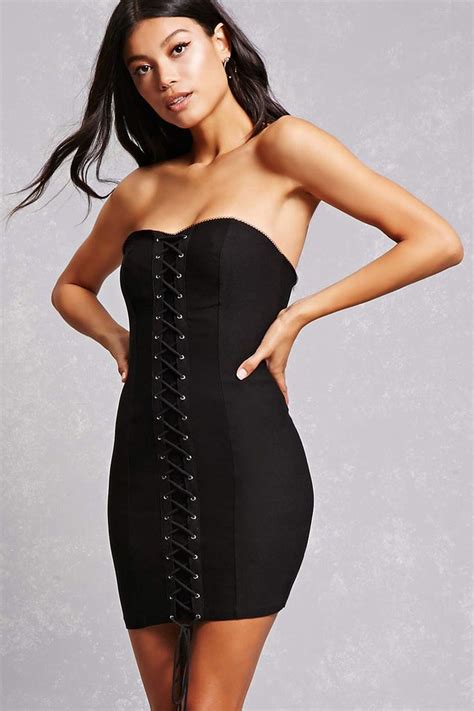 A Strapless Knit Bodycon Dress Featuring A Crisscross Lace Up Front
