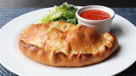 You can read the story, ingredients, and details that go along with these recipes. Calzone Recipe Food Wishes - Chef John - YUM - EverybodyLovesItalian.comEverybodyLovesItalian.com