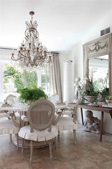 Create an inviting atmosphere with new living room chairs. gray chair and neutral slipcovers | French country dining room
