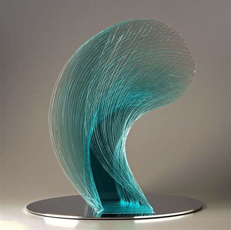 Artist Niyoko Ikuta Uses Layers Of Laminated Sheet Glass To Create Spiraling Geometric