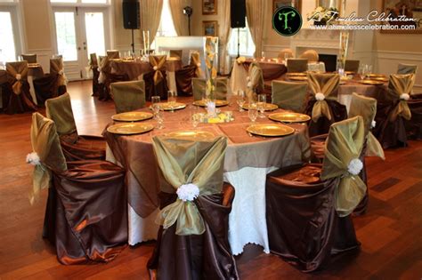 230 chair covers with cadbury purple satin sashes runners cake and top table swag, also our chalice centres, with mirror plates and diamond t lights, we added. Gold brown and orange fall wedding reception table setting ...