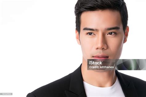 Portrait Of Handsome Young Asian Man Isolated On White Background